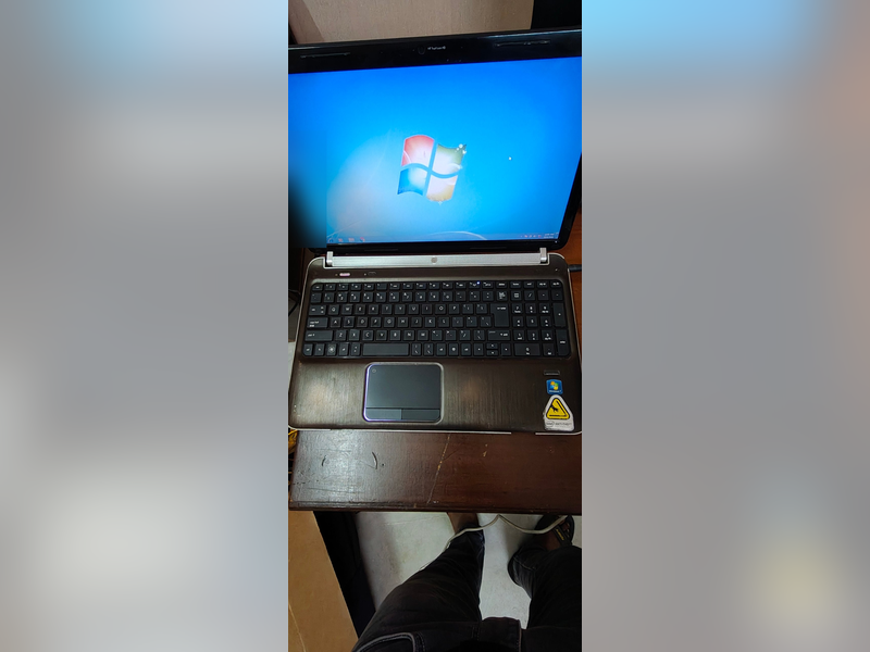 Click to enlarge HP Pavilion dv6 Laptop with Intel Anti-Theft (Windows 7), open, powered on